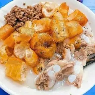 Hình ảnh Cháo sườn sụn nấm quẩy kèm Coca
