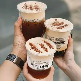 Hình ảnh Trà sữa trân châu đường đen kem trứng cà phê