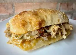 The Hadoken - Roasted chicken sandwich - Bánh mì gà nướng sốt cay quyện phô mai - 220.000 ₫ tại Big Boss Bistro - Sandwich Bánh Mì Kẹp - Trần Hưng Đạo