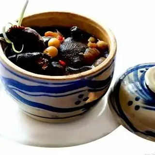 Hình ảnh Gà ác - 2 trứng vịt lộn tiềm thuốc Bắc