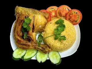 Cơm đùi lớn - góc tư - 65.000 ₫ tại Cơm Gà Xối Mỡ Thạch Lam - Đoàn Văn Bơ