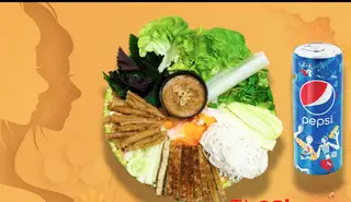 Hình ảnh Bún trộn nem nướng và pepsi