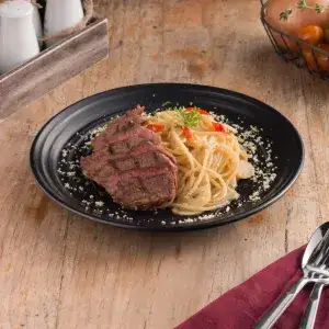 Steak strips with spaghetti aglio e olio - 232.050 ₫ tại Downtown Steakhouse - Nguyễn Huệ