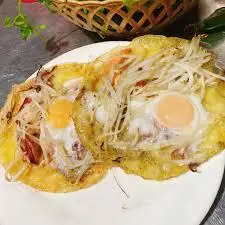Bánh xèo ốp la - 18.000 ₫ tại Bánh Xèo Cô Nguyệt 446 - Bánh Xèo - 446 Phạm Văn Chiêu