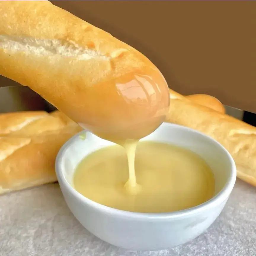 Bánh Mì Chấm Sữa - 12.000 ₫ tại Bánh Mì Que - Bay Baguette - Hoàng Văn Thụ
