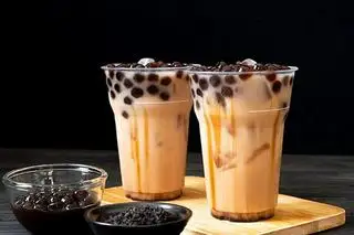 Trà sữa Thái xanh kèm Trân châu - 25.000 ₫ tại Tý Bún - Bún Cá, Bánh Canh Cá Dầm & Trà Sữa - Bùi Điền