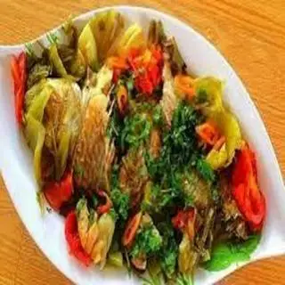 Hình ảnh Cá chép om dưa