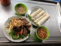 Hình ảnh Cuốn đu đủ bò khô chạo nem chua - 3 cái