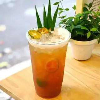 Hình ảnh Hồng trà sốt tắc sủi bọt