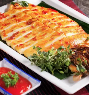 Mực nướng satế - 54.000 ₫ tại Vú Heo & Bạch Tuộc Nướng - Tân Hoà Đông