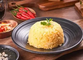 Cơm thêm - 12.000 ₫ tại Cơm Gà Xối Mỡ 142 - Lê Văn Duyệt