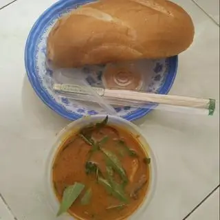 Hình ảnh phá lấu bánh mì+ trà bông cúc la hán quả 