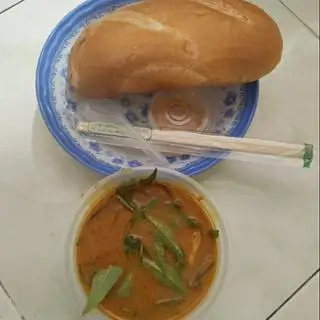 Hình ảnh phá lấu bò bánh mì + trà bông cúc la hán quả