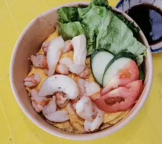 Hình ảnh Cơm chiên tôm mực phủ trứng
