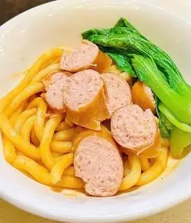 Hình ảnh Mì trộn Udon phô mai cay xúc xích cá viên