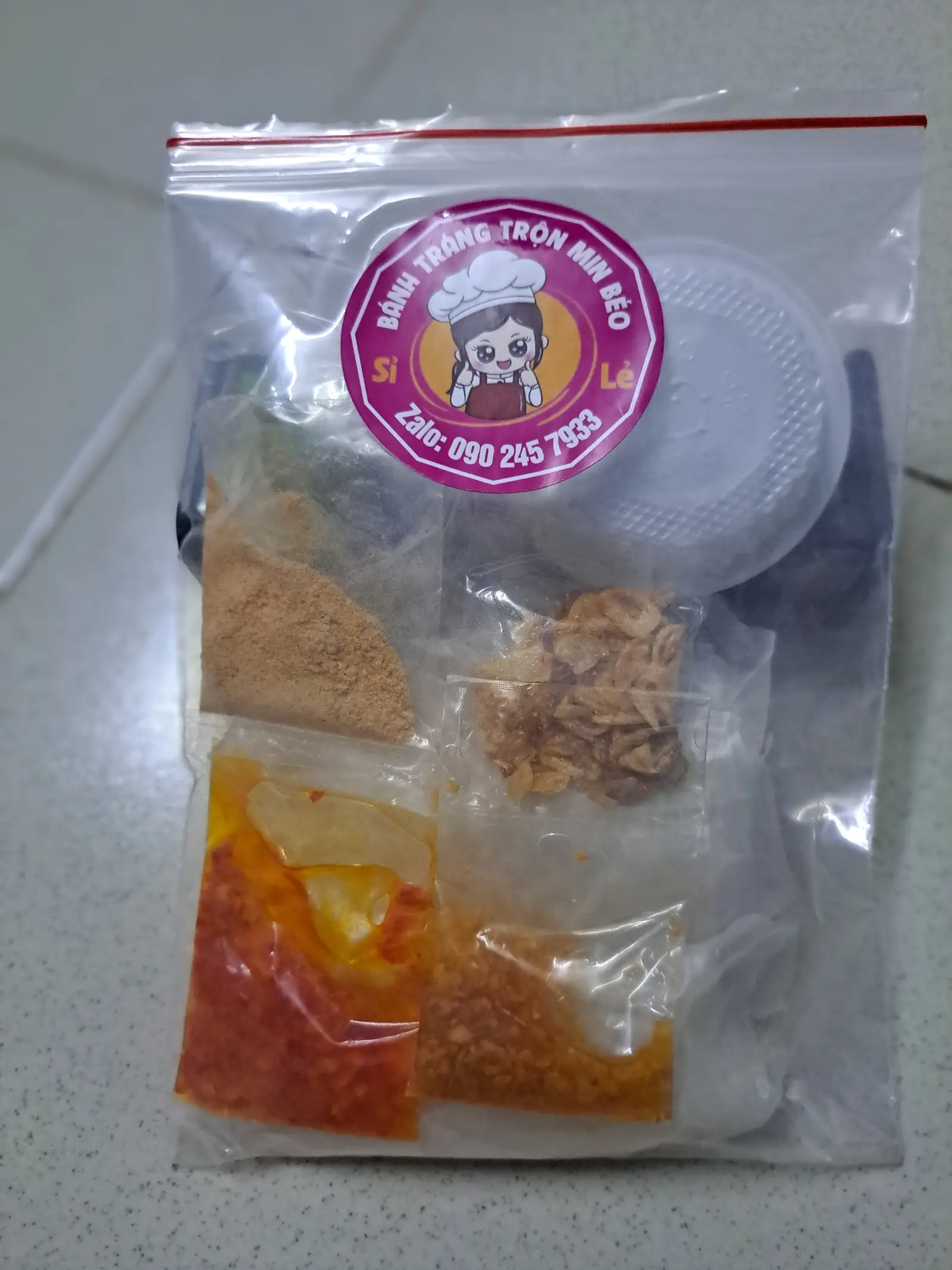 Hình ảnh Bánh tráng dẻo ớt rim mật ong hành phi