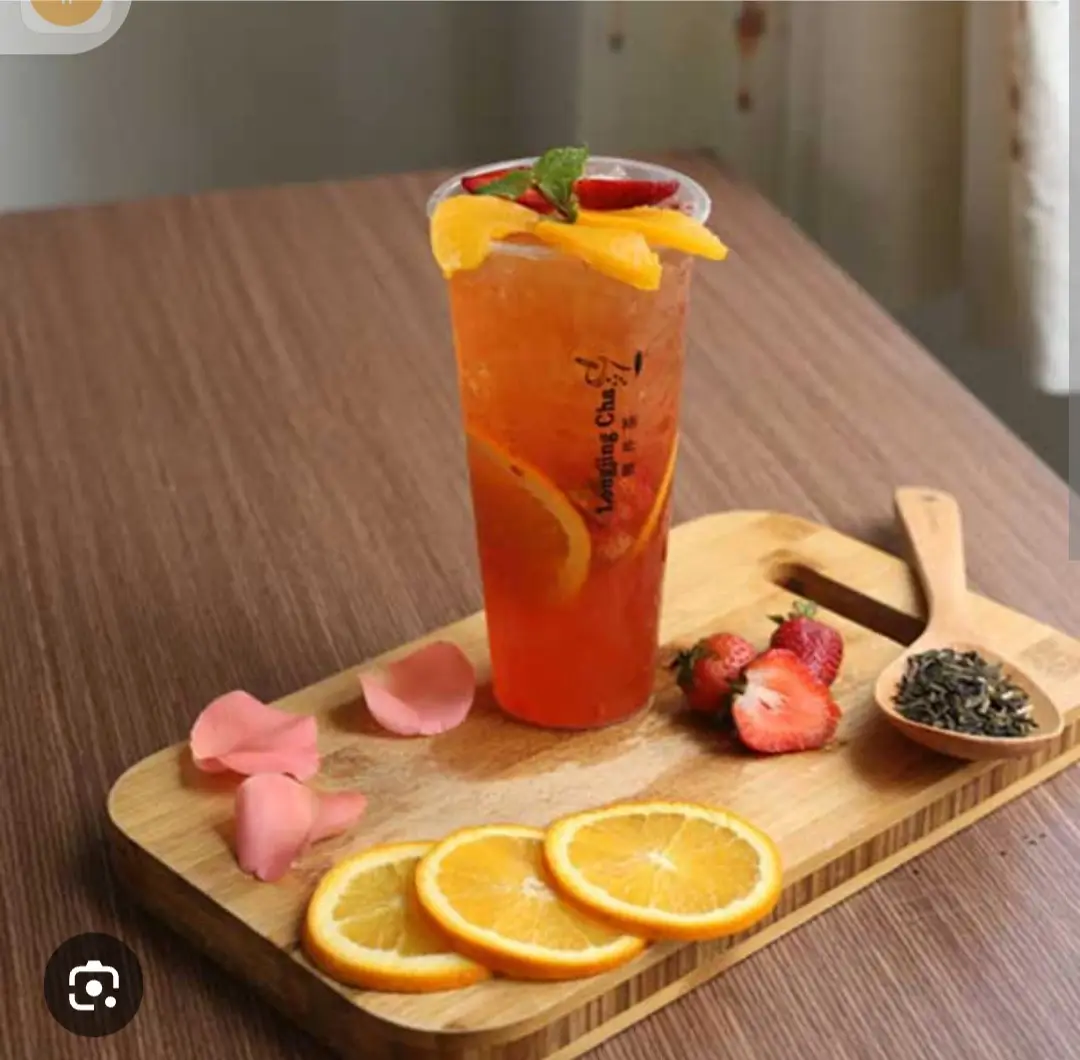 Hình ảnh Trà cam dâu hạt đác