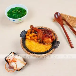 Hình ảnh Cơm Niêu 2 Mặt cháy Đùi gà Sốt nấm