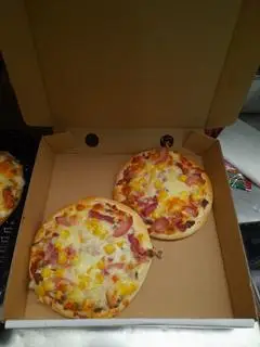 Hình ảnh 1 pizza bò+ 1 pizza thập cẩm size 14