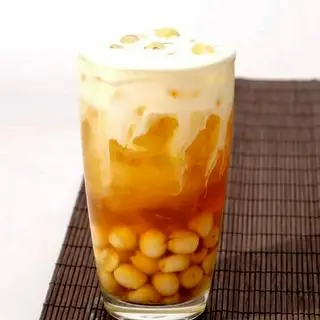 Hình ảnh Trà sen vàng macchiato