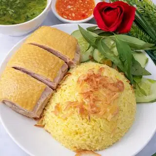 Hình ảnh Cơm má đùi chặt sốt bơ