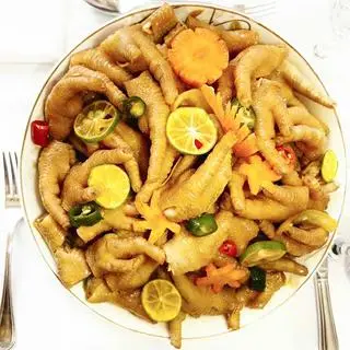 Hình ảnh Chân gà ngâm chanh mật ong có xương hũ 500gr