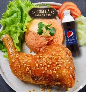 Hình ảnh COMBO: CƠM GÀ SỐT MẮM TỎI ( ĐÙI GỐC TƯ) + CANH RONG BIỂN + COCA/PEPSI