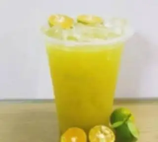 Hình ảnh Nước mía ép tắc ly lớn