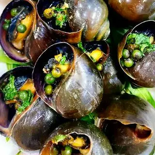 Hình ảnh Ốc bưu nướng tiêu xanh