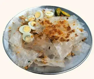 Hình ảnh Bánh Tráng Trộn Muối Tỏi Nguên Bản