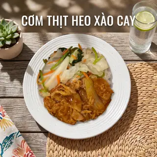 Hình ảnh Cơm Thịt Heo Xào Cay