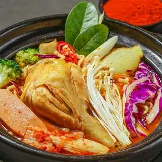 Hình ảnh Mì lẩu Thái đùi gà