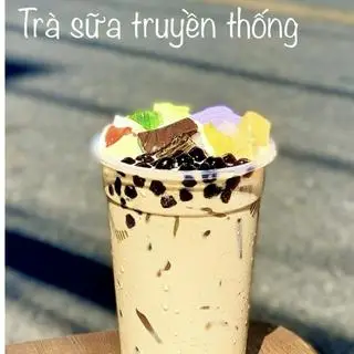 Hình ảnh Trà sữa kem trứng dừa nướng full topping 