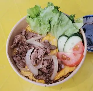 Hình ảnh Cơm gạo lứt bò phủ trứng