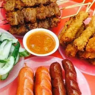 Hình ảnh 7 thịt xiên nướng - 2 dồi sụn nướng - 2 xúc xích - Dưa leo-5nem rán