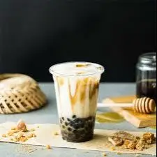 Hình ảnh Ô long nhân sâm dát vàng