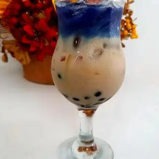 Hình ảnh Trà Sữa Hoa Đậu Biếc Full Topping