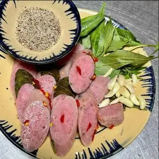 Hình ảnh NÊM CHUA ĂN KÈM TỎI ỚT RAU RĂM 