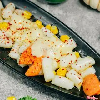 Hình ảnh Tteokbokki sốt bơ phô mai