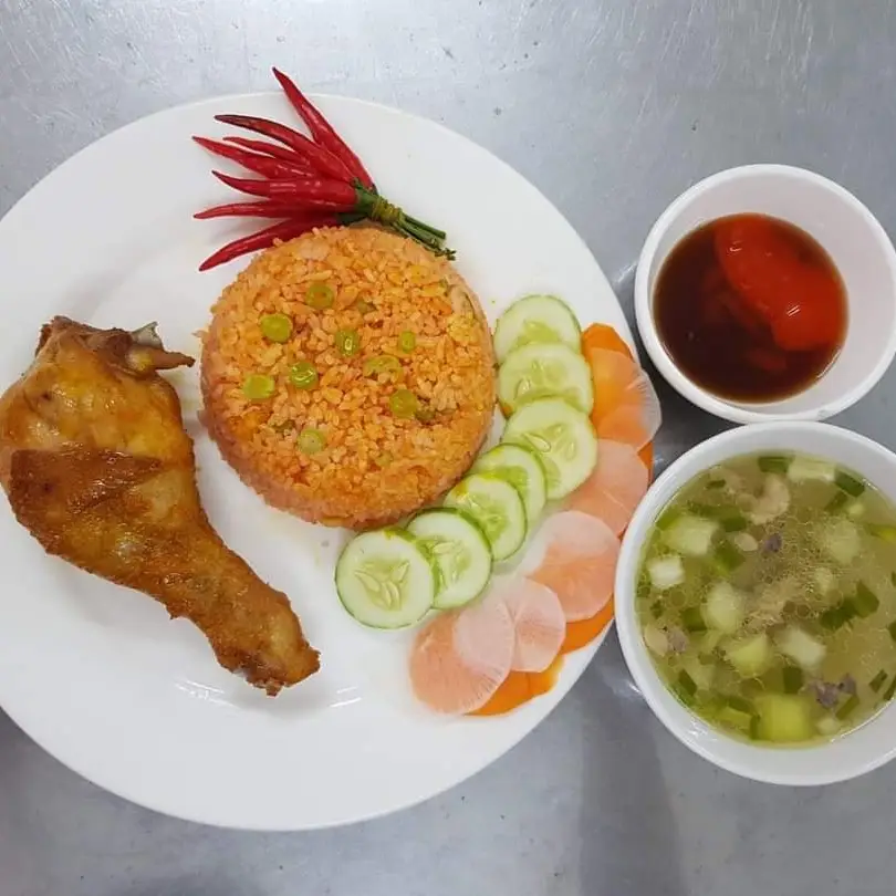 Hình ảnh cơm đùi tỏi xối mỡ 