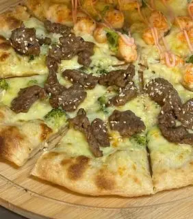 Hình ảnh Pizza bò tiêu đen