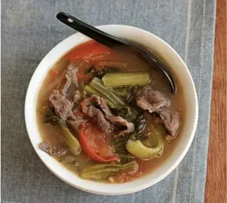 Hình ảnh Canh bò nấu dưa cải chua