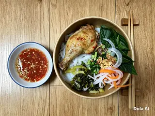 Hình ảnh Bánh ướt đùi gà rim bơ tỏi
