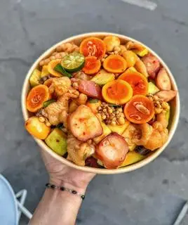 Hình ảnh Chân gà + gân bò + sứa + trứng non sốt thái