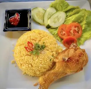 Hình ảnh cơm đùi tỏi xối mỡ