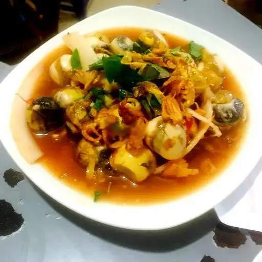 Hình ảnh Trứng cút lộn xào me 10 q