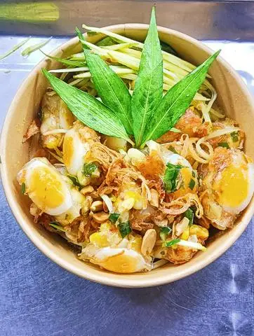 Hình ảnh Tóp mỡ cuộn lồng đào rồi trộn 