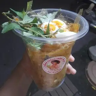Hình ảnh Bánh tráng ớt rim trứng lòng đào