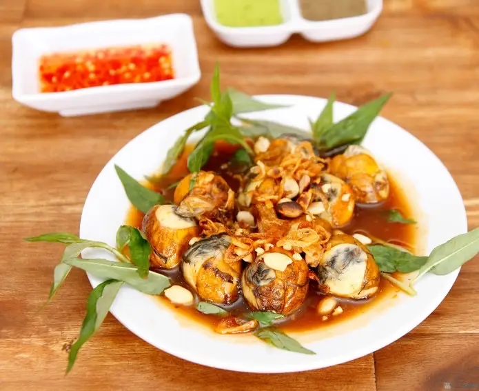 Hình ảnh Cút lộn xào me