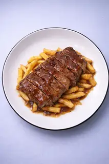 Hình ảnh Khoai tây phủ steak sốt tiêu đen